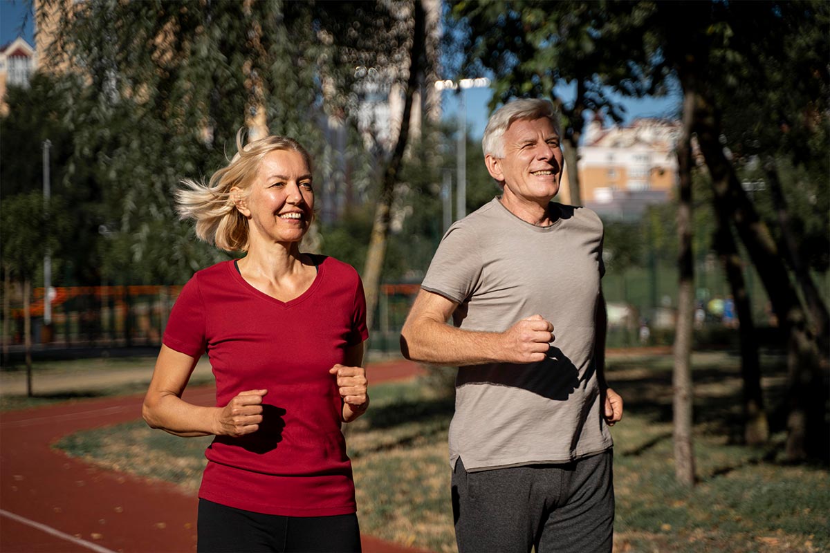 Older couple going for a run outside